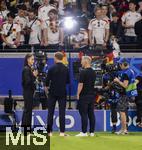 23.06.2024, Fussball UEFA EURO 2024, Vorrunde, 3.Spieltag, Schweiz - Deutschland, in der Frankfurt-Arena in Frankfurt am Main, TV-Interview nach dem Spiel, v.re: TV Experte Bastian Schweinsteiger (Deutschland) und Trainer Julian Nagelsmann (Deutschland), Moderatorin Esther Sedlaczek (Deutschland)

