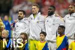 23.06.2024, Fussball UEFA EURO 2024, Vorrunde, 3.Spieltag, Schweiz - Deutschland, in der Frankfurt-Arena in Frankfurt am Main, Aufstellung zur Nationalhymne, v.li: Ilkay Gndogan (Deutschland), Torwart Manuel Neuer (Deutschland), Antonio Rdiger (Deutschland), Jonathan Tah (Deutschland), 