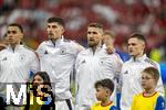 23.06.2024, Fussball UEFA EURO 2024, Vorrunde, 3.Spieltag, Schweiz - Deutschland, in der Frankfurt-Arena in Frankfurt am Main, Aufstellung zur Nationalhymne, v.li: Jamal Musiala (Deutschland), Kai Havertz (Deutschland), Robert Andrich (Deutschland), Florian Wirtz (Deutschland), 
