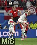 02.07.2024, Fussball UEFA EURO 2024, Achtelfinale, sterreich - Trkei, in der RB Arena Leipzig,  v.l. Philipp Lienhart (sterreich) gegen Baris Yilmaz (Trkei)    

