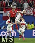 02.07.2024, Fussball UEFA EURO 2024, Achtelfinale, sterreich - Trkei, in der RB Arena Leipzig,  v.l. Philipp Lienhart (sterreich) gegen Baris Yilmaz (Trkei)    

