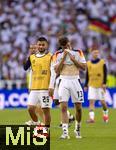 05.07.2024, Fussball UEFA EURO 2024, Viertelfinale, Spanien - Deutschland, in der Stuttgart-Arena. Frust nach dem Spiel bei Thomas Mller (re, Deutschland) und Deniz Undav (li, Deutschland) 

