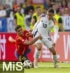 05.07.2024, Fussball UEFA EURO 2024, Viertelfinale, Spanien - Deutschland, in der Stuttgart-Arena. v.li: Rodri (Spanien) gegen Jamal Musiala (Deutschland) 

