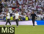 05.07.2024, Fussball UEFA EURO 2024, Viertelfinale, Spanien - Deutschland, in der Stuttgart-Arena. Frustrierter Abgang der Deutschen nach der Niederlage und dem Ausscheiden aus dem Turnier, v.li: Co-Trainer Sandro Wagner (Deutschland), Co-Trainer Benjamin Glck (Deutschland), Trainer Julian Nagelsmann (Deutschland),  

