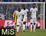 09.07.2024, Fussball UEFA EURO 2024, Halbfinale, Spanien - Frankreich, in der Mnchner-Fussball-Arena. v.l. Dayot Upamecano (Frankreich), N'Golo Kante (Frankreich) und Aurelien Tchouameni (Frankreich) sind nach dem 2:1 enttuscht 
