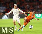 10.09.2024, Fussball UEFA Nations League 2024/25, Gruppe 3, 2. Spieltag, Niederlande - Deutschland, in der Johan Cruyff Arena Amsterdam. (L-R) Florian Wirtz (Deutschland) gegen Xavi Simons (Niederlande)