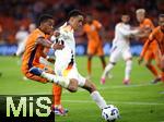 10.09.2024, Fussball UEFA Nations League 2024/25, Gruppe 3, 2. Spieltag, Niederlande - Deutschland, in der Johan Cruyff Arena Amsterdam. (L-R) Jurrien Timber (Niederlande) gegen Jamal Musiala (Deutschland)