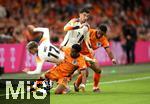 10.09.2024, Fussball UEFA Nations League 2024/25, Gruppe 3, 2. Spieltag, Niederlande - Deutschland, in der Johan Cruyff Arena Amsterdam. (L-R) Florian Wirtz (Deutschland) gegen Quinten Timber (Niederlande), Kai Havertz (Deutschland), Jurrien Timber (Niederlande)