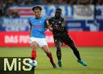 14.09.2024, Fussball 1. Bundesliga 2024/2025, 3. Spieltag, Holstein Kiel - FC Bayern Mnchen, im Holstein-Stadion Kiel. (L-R) Shuto Machino (Holstein Kiel) gegen Dayot Upamecano (Bayern Mnchen)


