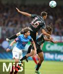 14.09.2024, Fussball 1. Bundesliga 2024/2025, 3. Spieltag, Holstein Kiel - FC Bayern Mnchen, im Holstein-Stadion Kiel. (L-R) Magnus Knudsen (Holstein Kiel) gegen Joao Palhinha (Bayern Mnchen) und Sacha Boey (Bayern Mnchen)


