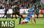 14.09.2024, Fussball 1. Bundesliga 2024/2025, 3. Spieltag, Holstein Kiel - FC Bayern Mnchen, im Holstein-Stadion Kiel. (L-R) Joao Palhinha (Bayern Mnchen) gegen Patrick Erras (Holstein Kiel) und Nicolai Remberg (Holstein Kiel)


