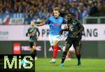 14.09.2024, Fussball 1. Bundesliga 2024/2025, 3. Spieltag, Holstein Kiel - FC Bayern Mnchen, im Holstein-Stadion Kiel. (L-R) Jann-Fiete Arp (Holstein Kiel) gegen Dayot Upamecano (Bayern Mnchen)


