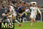 14.10.2024, Fussball UEFA Nations League 2024/25, Gruppe 3, 4.Spieltag, Deutschland - Niederlande, in der Allianz-Arena in Mnchen. v.l. Nico Schlotterbeck (Deutschland), Xavie Simons (Niederlande) und Florian Wirtz (Deutschland) 