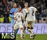 14.10.2024, Fussball UEFA Nations League 2024/25, Gruppe 3, 4.Spieltag, Deutschland - Niederlande, in der Allianz-Arena in Mnchen. v.l. Torwart Oliver Baumann (Deutschland), Josua Kimmich (Deutschland) Nico Schlotterbeck (Deutschland) und Antonio Rdiger (Deutschland)   jubeln