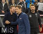 14.10.2024, Fussball UEFA Nations League 2024/25, Gruppe 3, 4.Spieltag, Deutschland - Niederlande, in der Allianz-Arena in Mnchen. v.li: Bundestrainer Julian Nagelsmann (Deutschland), Thomas Mller (FC Bayern Mnchen)  Co-Trainer Sandro Wagner (Deutschland) 