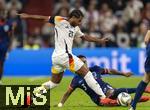 14.10.2024, Fussball UEFA Nations League 2024/25, Gruppe 3, 4.Spieltag, Deutschland - Niederlande, in der Allianz-Arena in Mnchen. v.li: Serge Gnabry (Deutschland) gegen Jorrel Hato (Niederlande) am Boden 