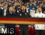 14.10.2024, Fussball UEFA Nations League 2024/25, Gruppe 3, 4.Spieltag, Deutschland - Niederlande, in der Allianz-Arena in Mnchen. v.l. Trainer Julian Nagelsmann (Deutschland) und Co-Trainer Sandro Wagner (Deutschland) singen die Nationalhymne