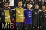 14.10.2024, Fussball UEFA Nations League 2024/25, Gruppe 3, 4.Spieltag, Deutschland - Niederlande, in der Allianz-Arena in Mnchen. Kevin Schade (Deutschland), Torwart Alexander Nbel (Deutschland) , Jonathan Burkardt (Deutschland) und Robin Gosens (Deutschland) liegen sich im Arm