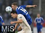 29.10.2024, Fussball DFB-Pokal 2024/2025, 2.Runde, FC Augsburg - FC Schalke 04, in der WWK-Arena Augsburg. v.l. Keven Schlotterbeck (FC Augsburg) gegen Janik Bachmann (Schalke) 


