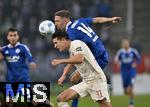 29.10.2024, Fussball DFB-Pokal 2024/2025, 2.Runde, FC Augsburg - FC Schalke 04, in der WWK-Arena Augsburg. v.l. Keven Schlotterbeck (FC Augsburg) gegen Janik Bachmann (Schalke) 


