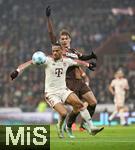 09.11.2024, Fussball 1. Bundesliga 2024/2025, 10. Spieltag, FC St. Pauli - FC Bayern Mnchen, im Millerntor-Stadion Hamburg. (L-R) Leroy Sane (Bayern Mnchen) gegen Eric Smith (FC St. Pauli)


