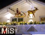 14.12.2024,  Winter in Bayern. Der Garten des Hauses von Daniel und Harry Lwenthal in Bad Wrishofen verwandelt sich tglich in einen Weihnachtstraum aus 150 000 Lichtern und Weihnachtsfiguren 