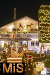 14.12.2024,  Winter in Bayern. Der Garten des Hauses von Daniel und Harry Lwenthal in Bad Wrishofen verwandelt sich tglich in einen Weihnachtstraum aus 150 000 Lichtern und Weihnachtsfiguren 