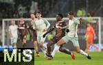 14.12.2024, Fussball 1. Bundesliga 2024/2025, 14. Spieltag, FC St. Pauli - Werder Bremen, im Millerntor-Stadion Hamburg. (L-R) Oladapo Afolayan (FC St. Pauli) gegen Niklas Stark (Werder Bremen)


