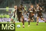 14.12.2024, Fussball 1. Bundesliga 2024/2025, 14. Spieltag, FC St. Pauli - Werder Bremen, im Millerntor-Stadion Hamburg. (L-R) Mitchell Weiser (Werder Bremen) gegen Oladapo Afolayan (FC St. Pauli)


