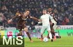 14.12.2024, Fussball 1. Bundesliga 2024/2025, 14. Spieltag, FC St. Pauli - Werder Bremen, im Millerntor-Stadion Hamburg. (L-R) Jackson Irvine (FC St. Pauli) gegen Romano Schmid (Werder Bremen)


