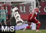 12.01.2025, Fussball 1. Bundesliga 2024/2025, 16. Spieltag, FC Augsburg - VfB Stuttgart, in der WWK-Arena Augsburg, Ogochukwu Frank Onyeka (Augsburg) segelt durch die Luft gegen Jeff Chabot (Stuttgart) 
 

