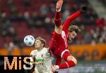 12.01.2025, Fussball 1. Bundesliga 2024/2025, 16. Spieltag, FC Augsburg - VfB Stuttgart, in der WWK-Arena Augsburg, v.li: Kristjan Jakic (FC Augsburg) gegen Jacob Bruun Larsen (Stuttgart) 