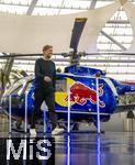 14.01.2025, Fussball, Pressekonferenz bei Red Bull in Salzburg, Jrgen Klopp (Global Head of Soccer bei Red Bull) stellt sich erstmals den Medien, im Hangar 7 am Salzburger Airport.  Jrgen Klopp kommt gut gelaunt zur PK, vorbei an einem Red Bull Hubschrauber