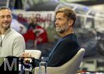 14.01.2025, Fussball, Pressekonferenz bei Red Bull in Salzburg, Jrgen Klopp (Global Head of Soccer bei Red Bull) stellt sich erstmals den Medien, im Hangar 7 am Salzburger Airport.  Jrgen Klopp, hinter ihm ein REDBULL-Flugzeug.