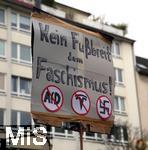 15.02.2024, Demonstration gegen AfD-Wahlkampfveranstaltung in Dsseldorf. Protestschild ?Kein Fubreit dem Faschismus? mit durchgestrichenem AfD, Tesla-Logo und Hakenkreuz.