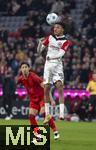 23.02.2025, Fussball 1. Bundesliga 2024/2025, 23. Spieltag,  FC Bayern Mnchen - Eintracht Frankfurt, in der Allianz-Arena Mnchen. v.li: Hiroki Ito (FC Bayern Mnchen) gegen Jean-Matteo Bahoya (Eintracht Frankfurt) 