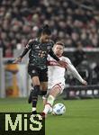 28.02.2025, Fussball 1. Bundesliga 2024/2025, 24. Spieltag,  VfB Stuttgart - FC Bayern Mnchen, in der MHP-Arena Stuttgart. (L-R) Michael Olise (Bayern Mnchen) gegen Maximilian Mittelstdt (VfB Stuttgart)

