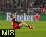 05.03.2025,  Fussball UEFA Championsleague 2024/2025: Achtelfinale, FC Bayern Mnchen - Bayer Leverkusen, in der Allianz-Arena Mnchen. Florian Wirtz (Leverkusen) verletzt am Boden.