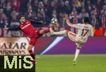 05.03.2025,  Fussball UEFA Championsleague 2024/2025: Achtelfinale, FC Bayern Mnchen - Bayer Leverkusen, in der Allianz-Arena Mnchen. v.li: Mario Hermoso (Leverkusen) gegen Michael Olise (FC Bayern Mnchen) 