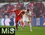 03.05.2025, Fussball 1. Bundesliga 2024/2025, 32. Spieltag, RB Leipzig - FC Bayern Mnchen, in der Red Bull Arena Leipzig, v.l. Leroy Sane (Bayern Mnchen) gegen Kosta Nedeljkovic (RB Leipzig) 


