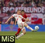 03.05.2025, Fussball 1. Bundesliga 2024/2025, 32. Spieltag, RB Leipzig - FC Bayern Mnchen, in der Red Bull Arena Leipzig, Lukas Klostermann (vorne, RB Leipzig) gegen Thomas Mller (FC Bayern Mnchen) 