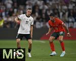 04.06.2025, Fussball UEFA Nations League 2024/25,  Halbfinale, Deutschland - Portugal, in der Allianz-Arena Mnchen. v.l. Florian Wirtz (Deutschland) gegen Ruben Neves (Portugal) 