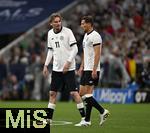 04.06.2025, Fussball UEFA Nations League 2024/25,  Halbfinale, Deutschland - Portugal, in der Allianz-Arena Mnchen. v.l. Nick Woltemade (Deutschland) und Leon Goretzka (Deutschland) nachdenklich,.