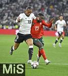 04.06.2025, Fussball UEFA Nations League 2024/25,  Halbfinale, Deutschland - Portugal, in der Allianz-Arena Mnchen. v.l. Leroy Sane (Deutschland) gegen Nuno Mendes (Portugal) 
