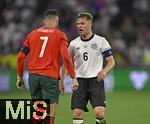 04.06.2025, Fussball UEFA Nations League 2024/25,  Halbfinale, Deutschland - Portugal, in der Allianz-Arena Mnchen. Josua Kimmich (Deutschland) schnauzt Cristiano Ronaldo (Portugal) an
