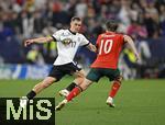 04.06.2025, Fussball UEFA Nations League 2024/25,  Halbfinale, Deutschland - Portugal, in der Allianz-Arena Mnchen. v.l. Florian Wirtz (Deutschland) gegen Bernardo Silva (Portugal) 