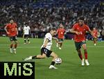 04.06.2025, Fussball UEFA Nations League 2024/25,  Halbfinale, Deutschland - Portugal, in der Allianz-Arena Mnchen. Florian Wirtz (Deutschland) gegen Goncalo Inacio (Portugal) 