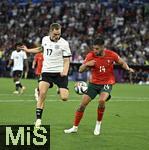 04.06.2025, Fussball UEFA Nations League 2024/25,  Halbfinale, Deutschland - Portugal, in der Allianz-Arena Mnchen. Florian Wirtz (Deutschland) gegen Goncalo Inacio (Portugal) 