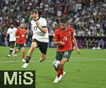 04.06.2025, Fussball UEFA Nations League 2024/25,  Halbfinale, Deutschland - Portugal, in der Allianz-Arena Mnchen. Florian Wirtz (Deutschland) gegen Goncalo Inacio (Portugal) 