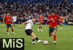 04.06.2025, Fussball UEFA Nations League 2024/25,  Halbfinale, Deutschland - Portugal, in der Allianz-Arena Mnchen. Florian Wirtz (Deutschland) am Ball gegen Goncalo Inacio (re, Portugal) 
